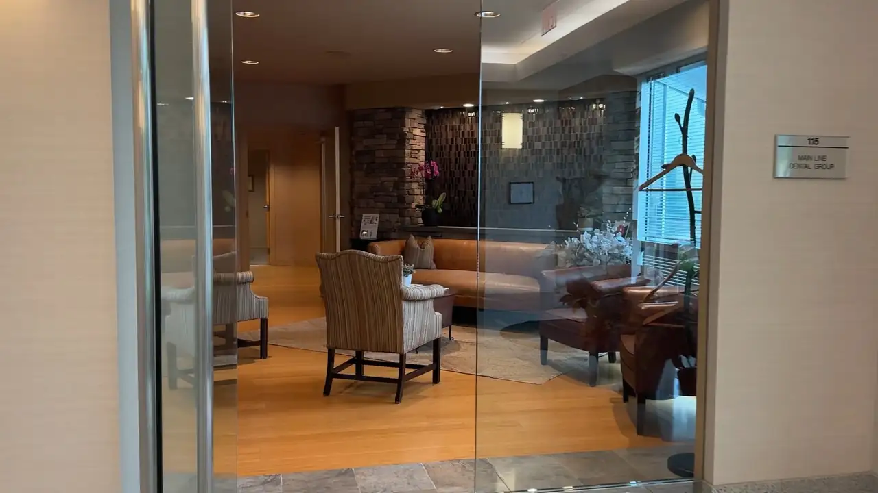 The lobby of Main Line Dental Group, seen through the glass doors of Suite 115 in Devon Square, Wayne.